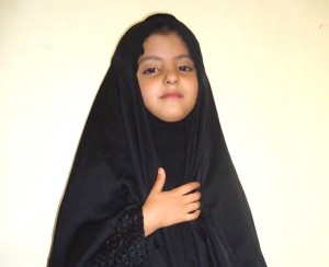 Young girl in black Hijab