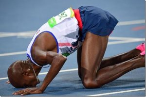 Britain's Mo Farah celebrates winning the Men's 10,000m during the athletics event at the Rio 2016 Olympic Games at the Olympic Stadium in Rio de Janeiro on Aug. 13, 2016. Frank Fife—AFP/Getty Images